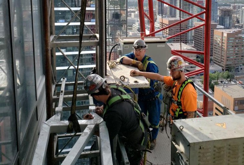 installation of temporary construction hoists and permanent industrial elevators Calgary Alberta Canada